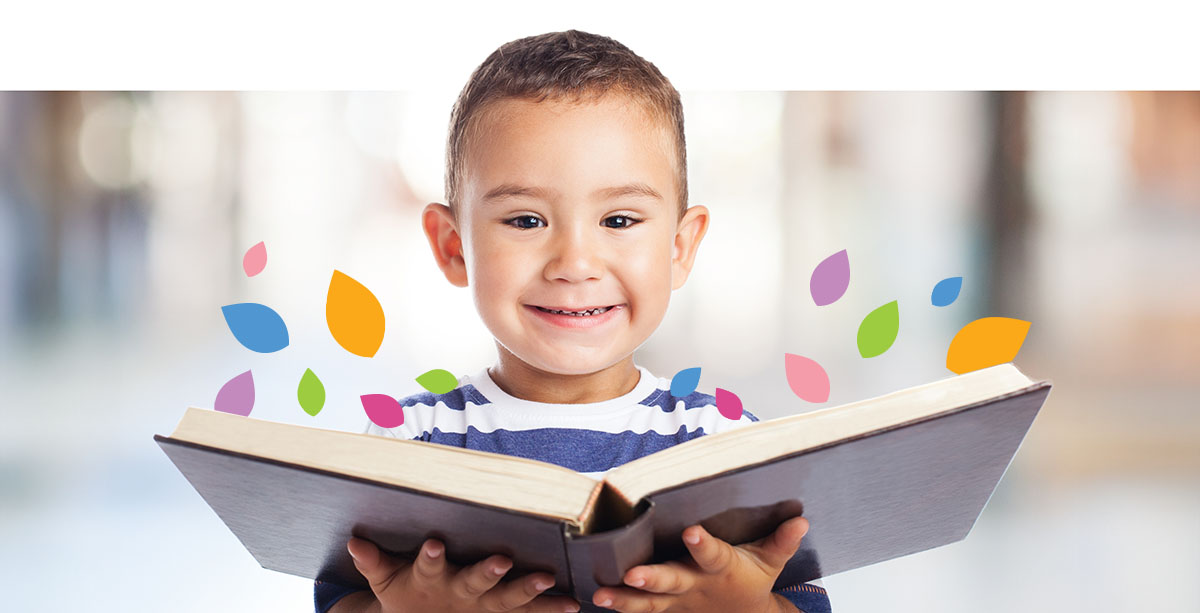 Child reading large book
